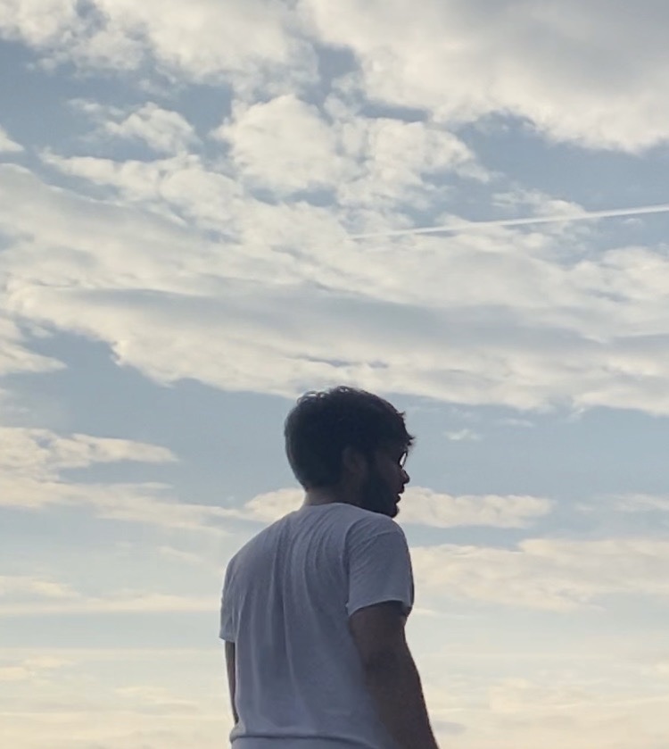 Picture of Sufiyan Naseem, owner of the page, with clouds in the background.